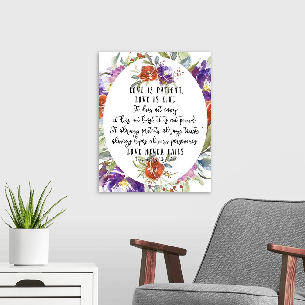 A modern room featuring Bible verse typography art in handlettered text, framed by blooming watercolor flowers.