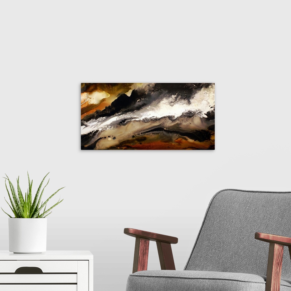 A modern room featuring Abstract artwork that uses mostly muted colors in cloud like shapes that blend together.