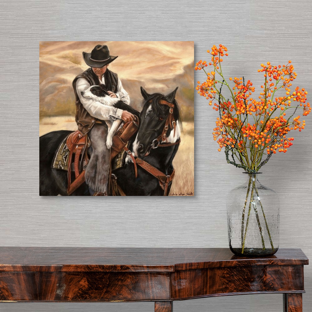 A traditional room featuring Contemporary artwork of a cowboy on horseback holding a border collie dog in his arms.