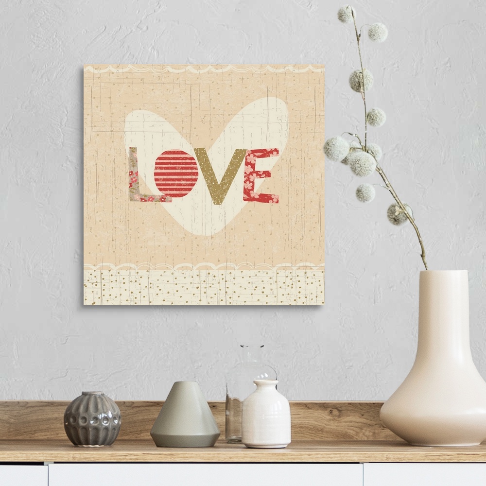 A farmhouse room featuring Collage style romantic artwork with a floral print border reading "Love."