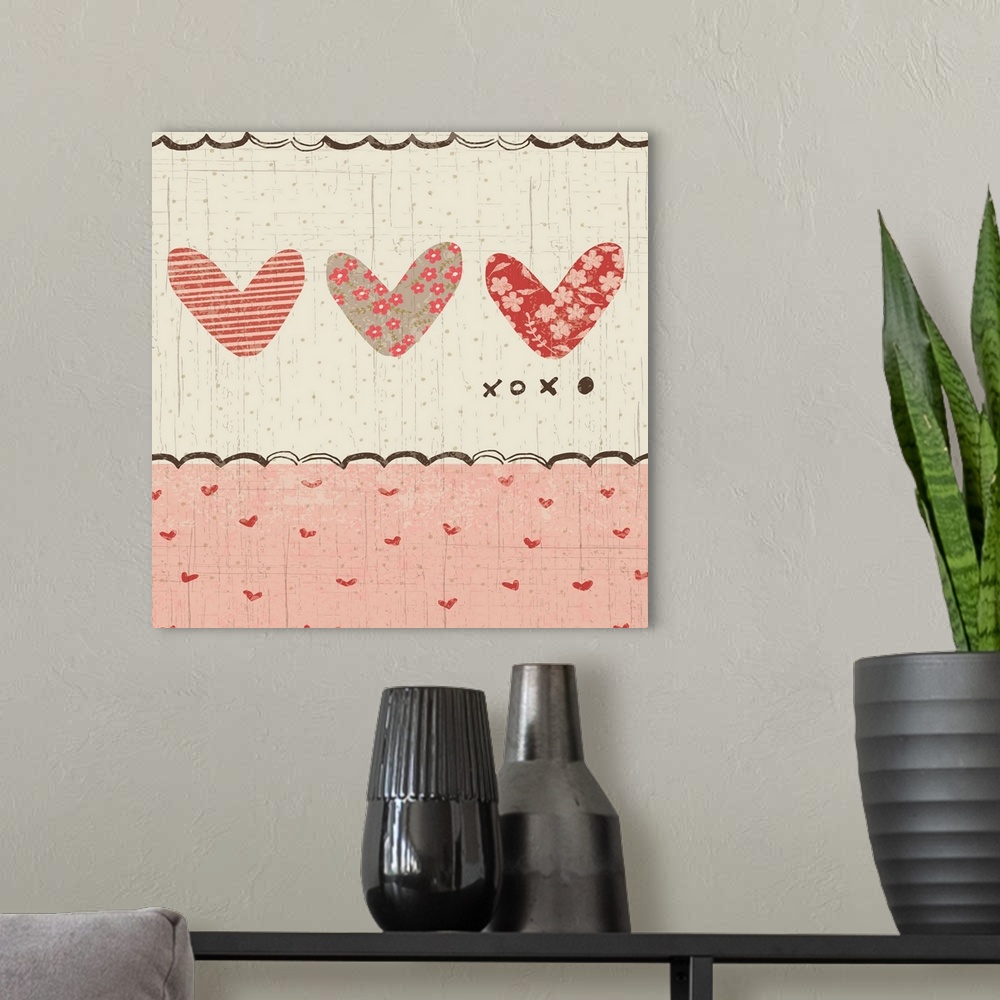 A modern room featuring Collage style romantic artwork with a heart print border with three cut-out hearts.