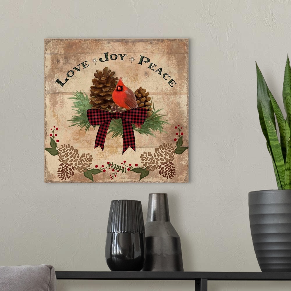 A modern room featuring Christmas decor of a cardinal with pinecones and a festive bow.
