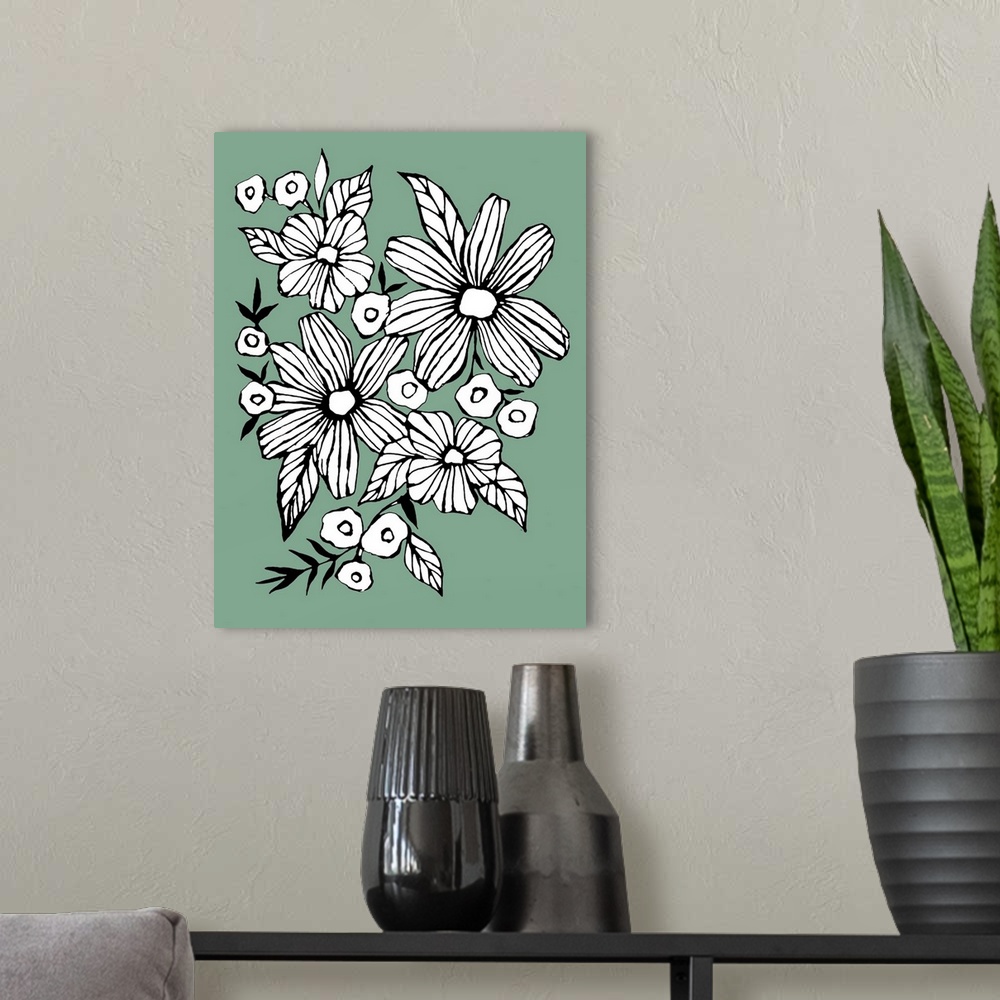 A modern room featuring Contemporary artwork of white flowers in a bold black outline against a muted green background.