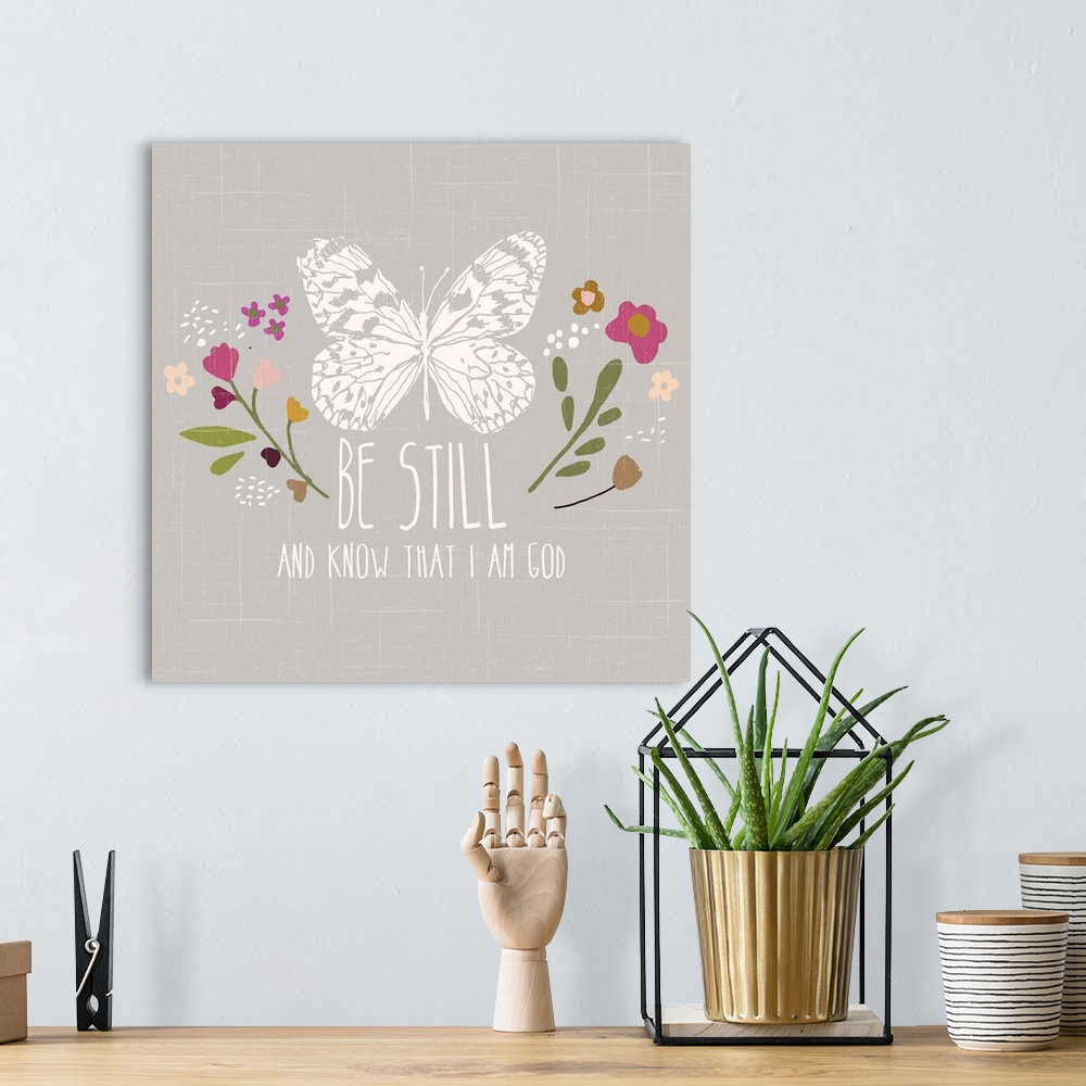 A bohemian room featuring "Be still and know that I am God" with a butterfly and flowers.