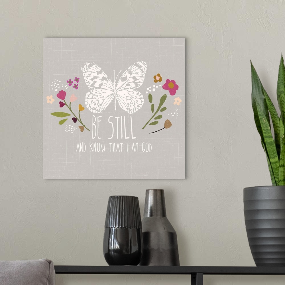 A modern room featuring "Be still and know that I am God" with a butterfly and flowers.