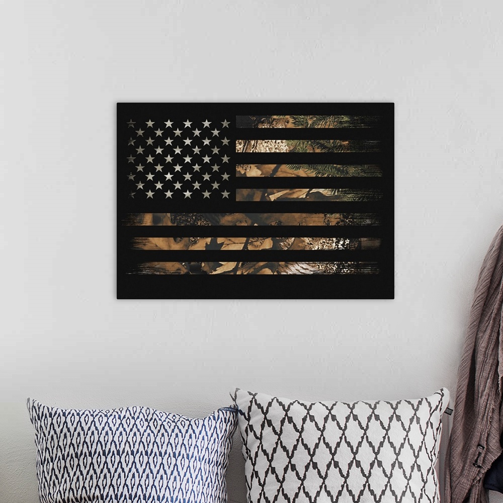 A bohemian room featuring An American flag with stars and stripes in leaf camouflage.