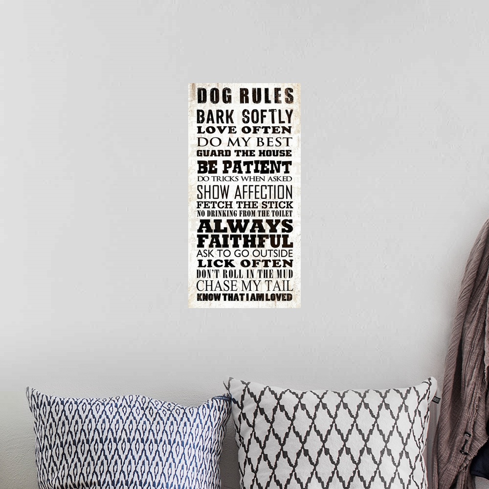 A bohemian room featuring Off white and tan background with black typography about dogs.