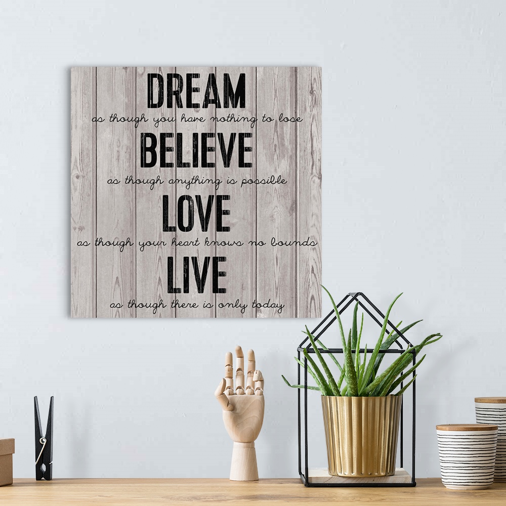 A bohemian room featuring Contemporary inspirational typography artwork.