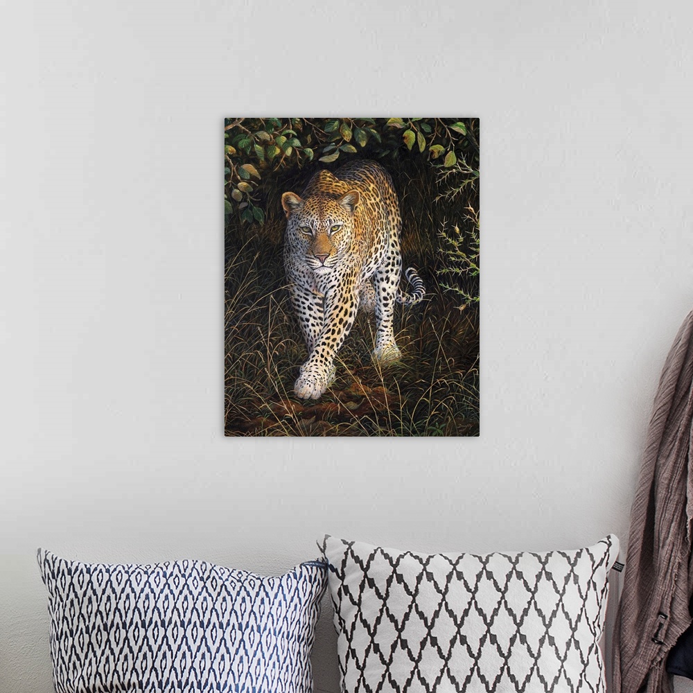 A bohemian room featuring Contemporary artwork of a leopard slowing walking out of cover from bushes.