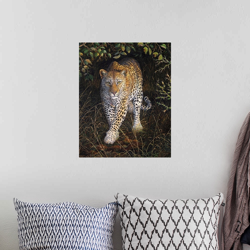 A bohemian room featuring Contemporary artwork of a leopard slowing walking out of cover from bushes.