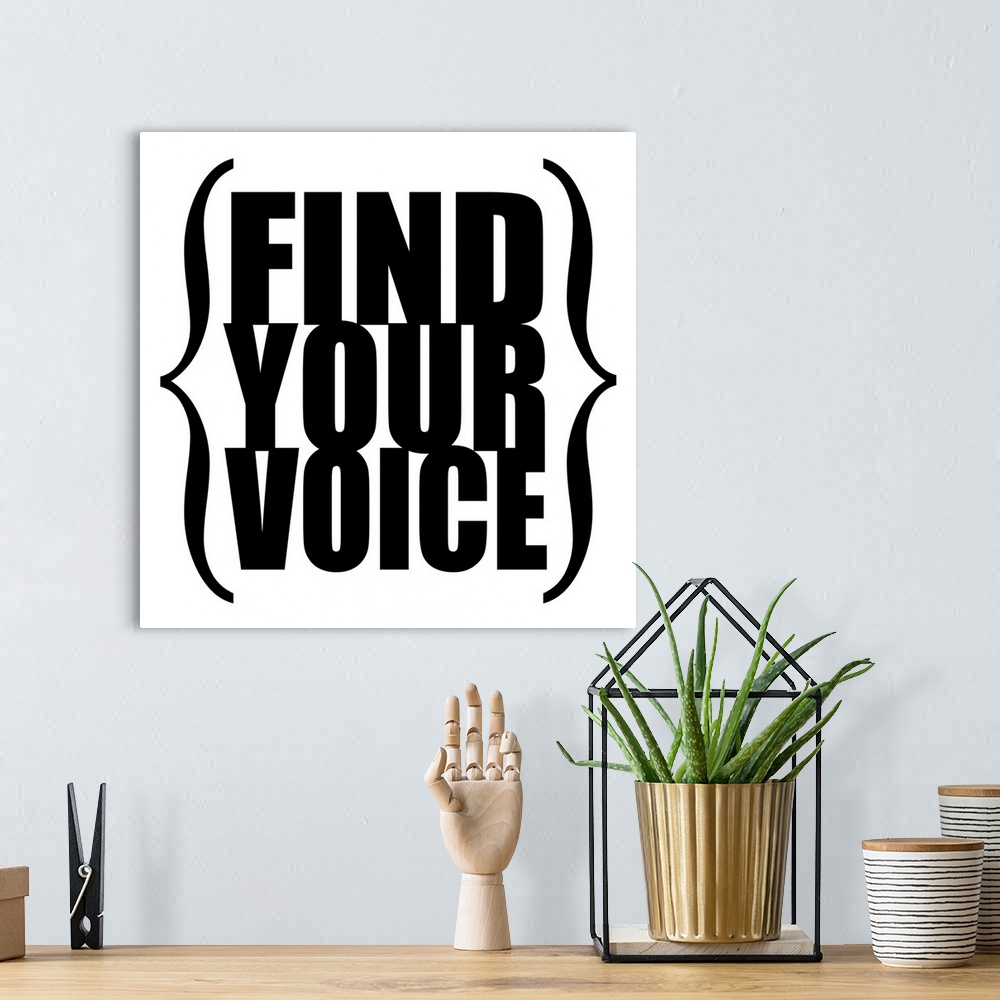 A bohemian room featuring Find Your Voice square, black on white