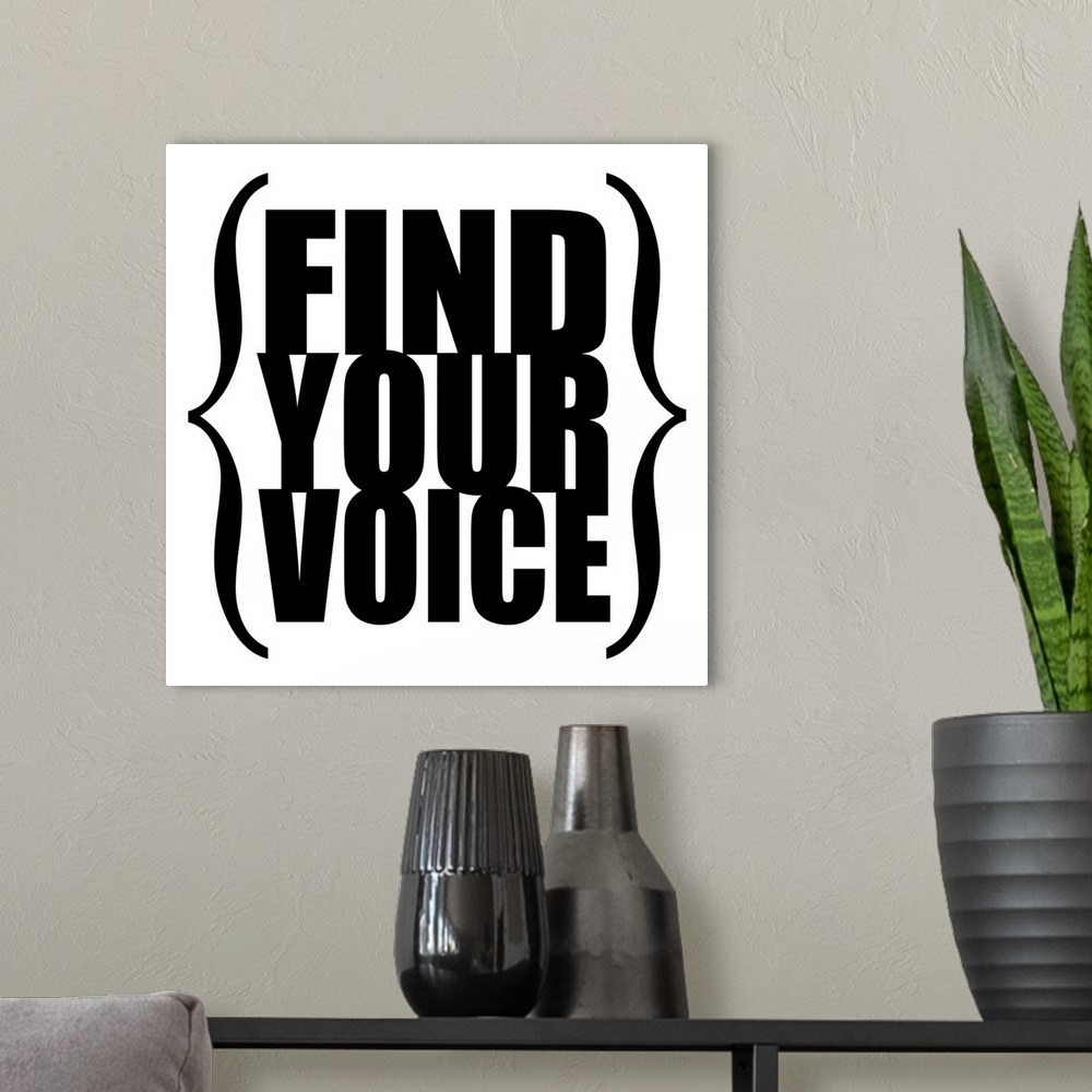 A modern room featuring Find Your Voice square, black on white