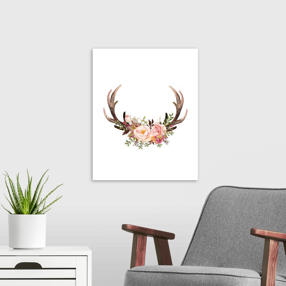 A modern room featuring A pair of antlers with an arrangement of watercolor flowers resting in the center.