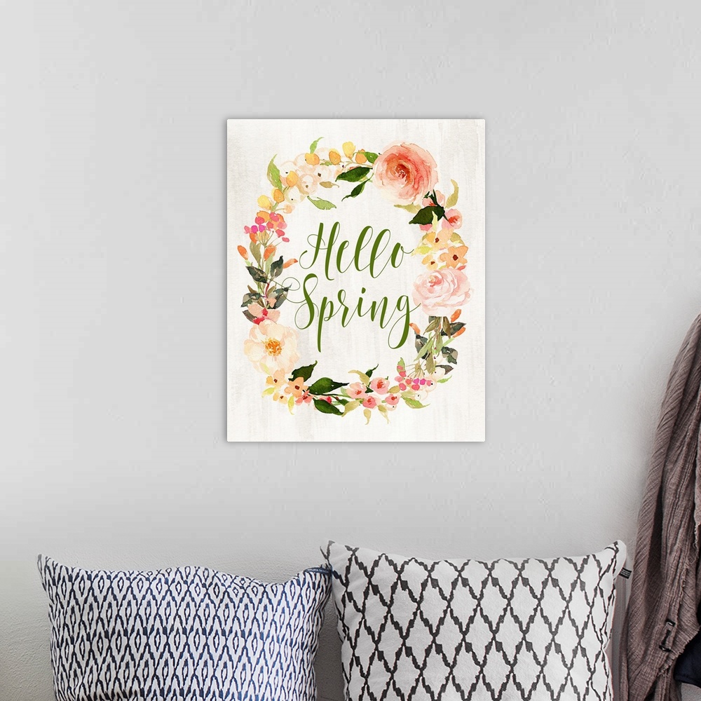 A bohemian room featuring Hello Spring in the center of a wreath of flowers.