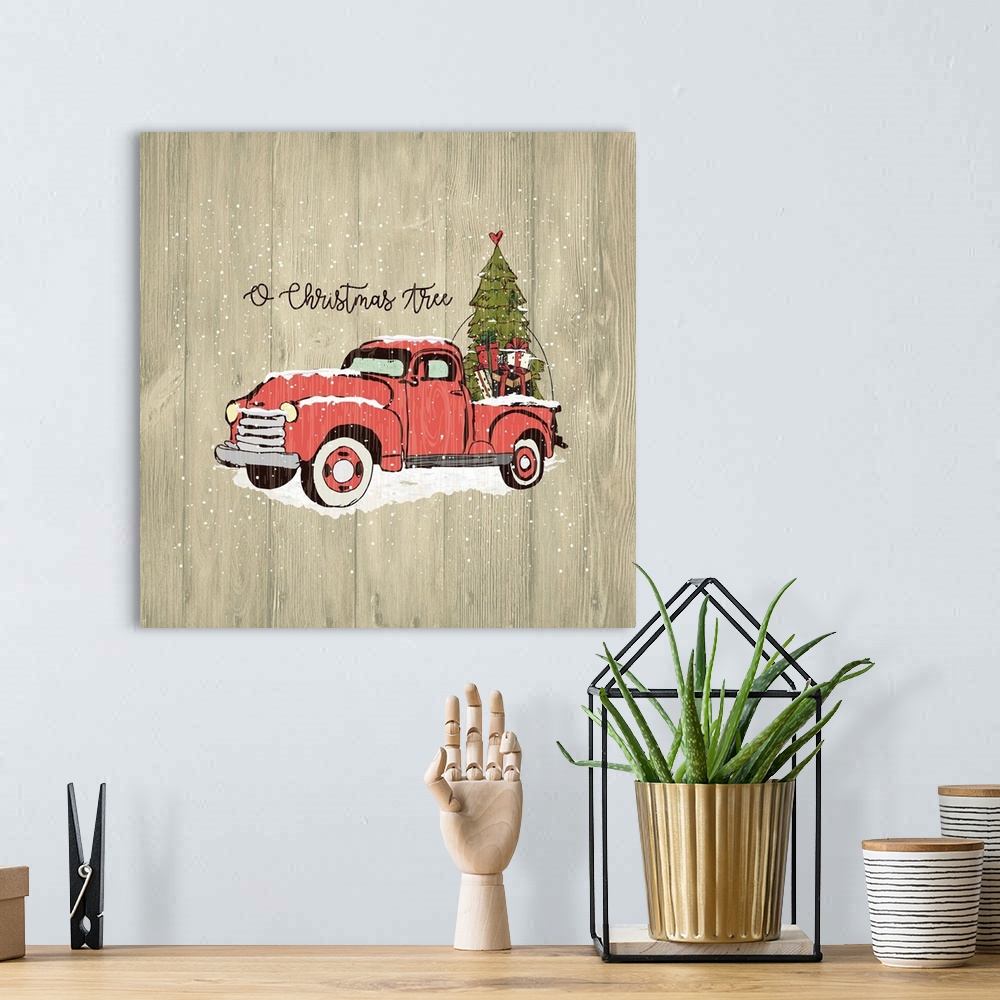 A bohemian room featuring Christmas decor of a vintage red truck carrying a Christmas tree and presents.