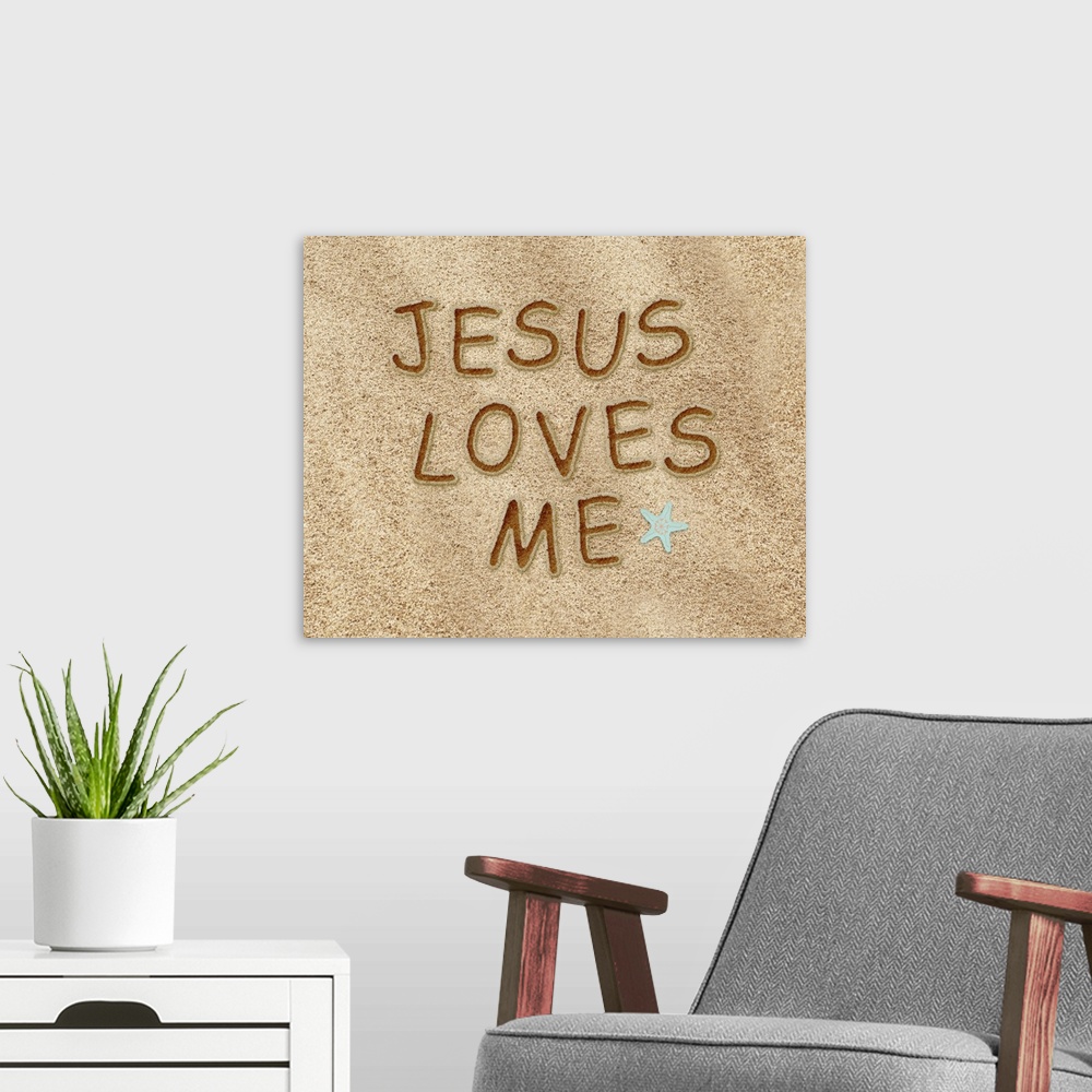 A modern room featuring "Jesus loves me" is drawn in the sand in this digital artwork.