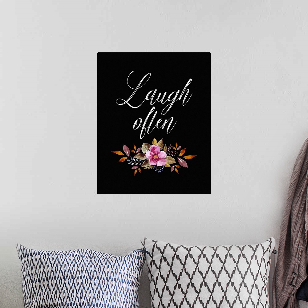 A bohemian room featuring Inspirational sentiment above a floral arrangement on a solid black background.
