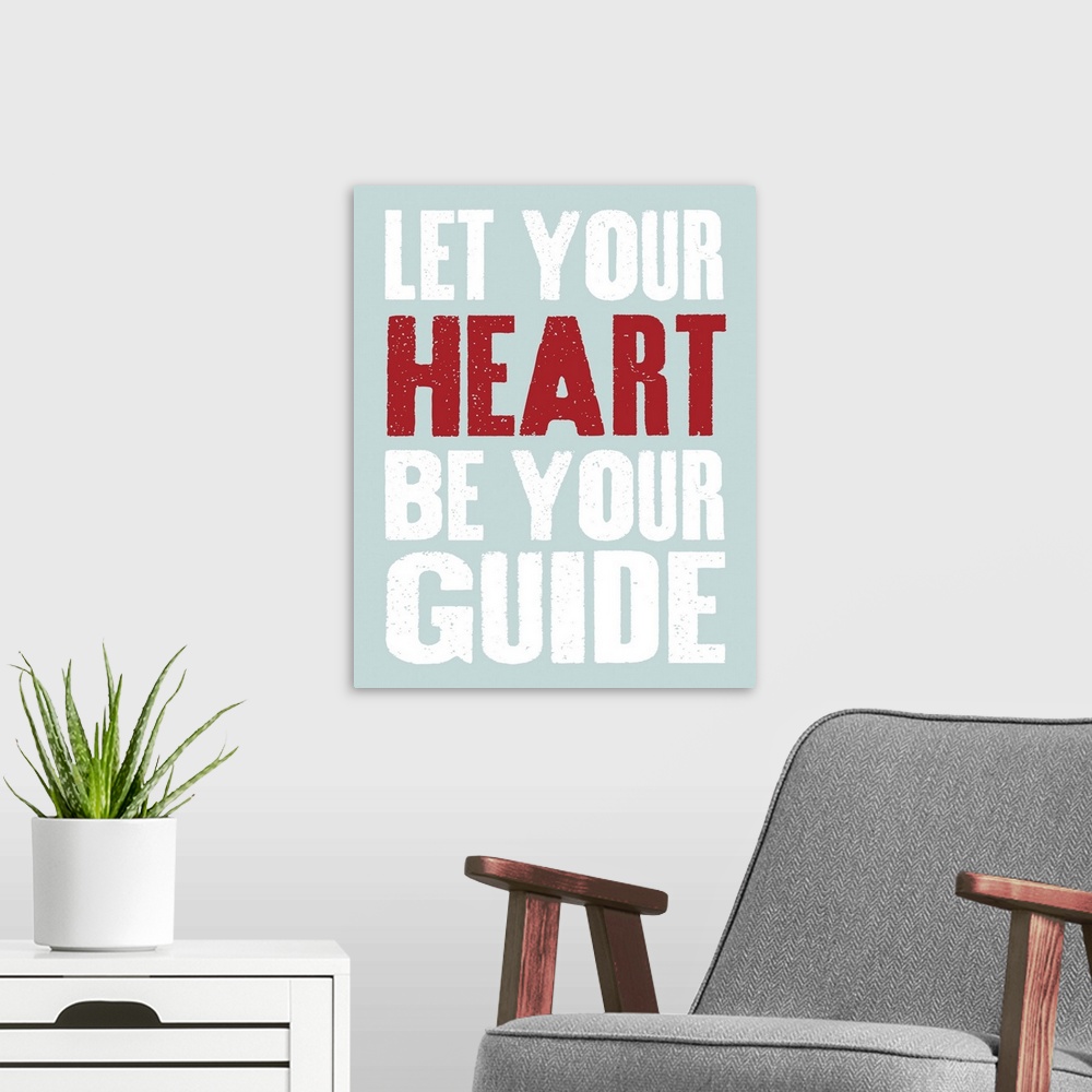 A modern room featuring Let Your Heart be Your Guide, blue