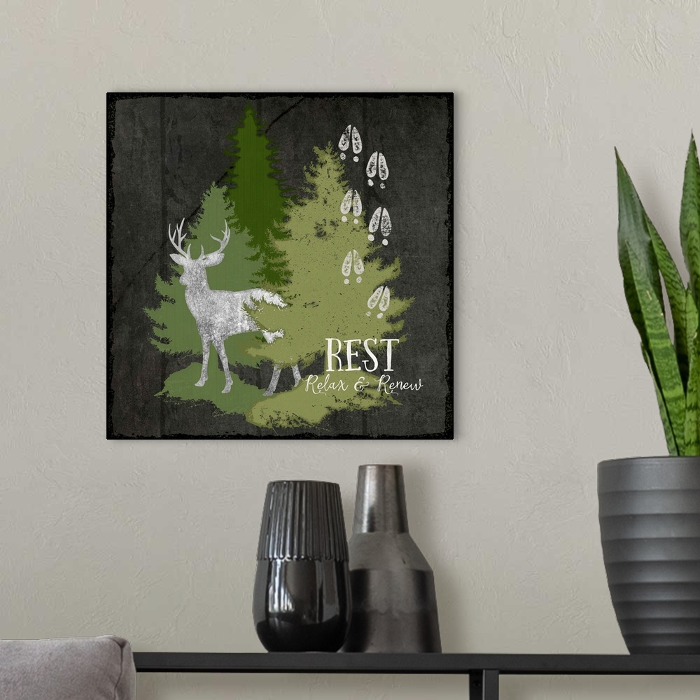 A modern room featuring Cabin decor of a deer silhouette with hoof tracks and pine trees.