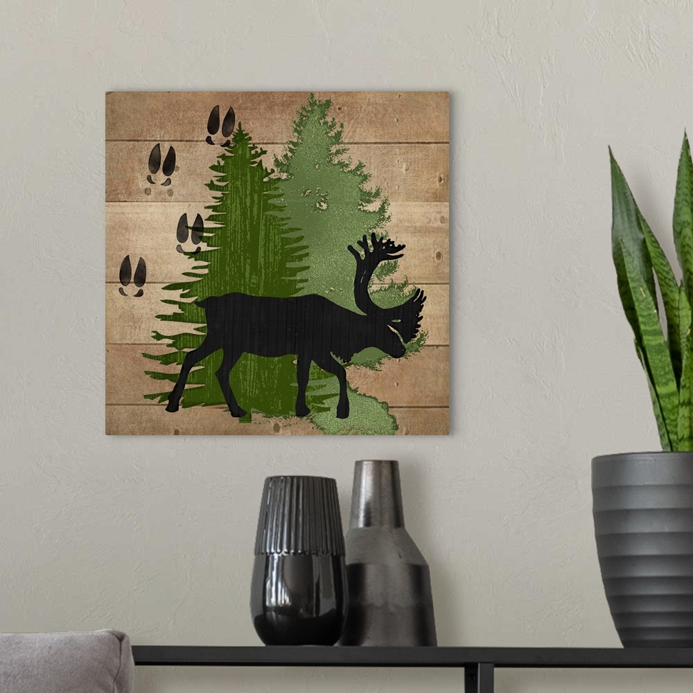 A modern room featuring Cabin decor of a reindeer silhouette with hoof tracks and pine trees.