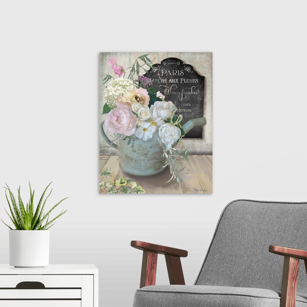 A modern room featuring A bouquet of roses and peonies in an old watering can next to a chalkboard sign.