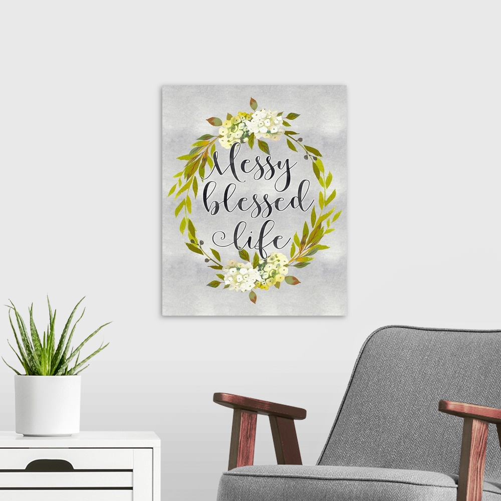 A modern room featuring A wreath of flowers and leaves surround the words, "Messy blessed life" .