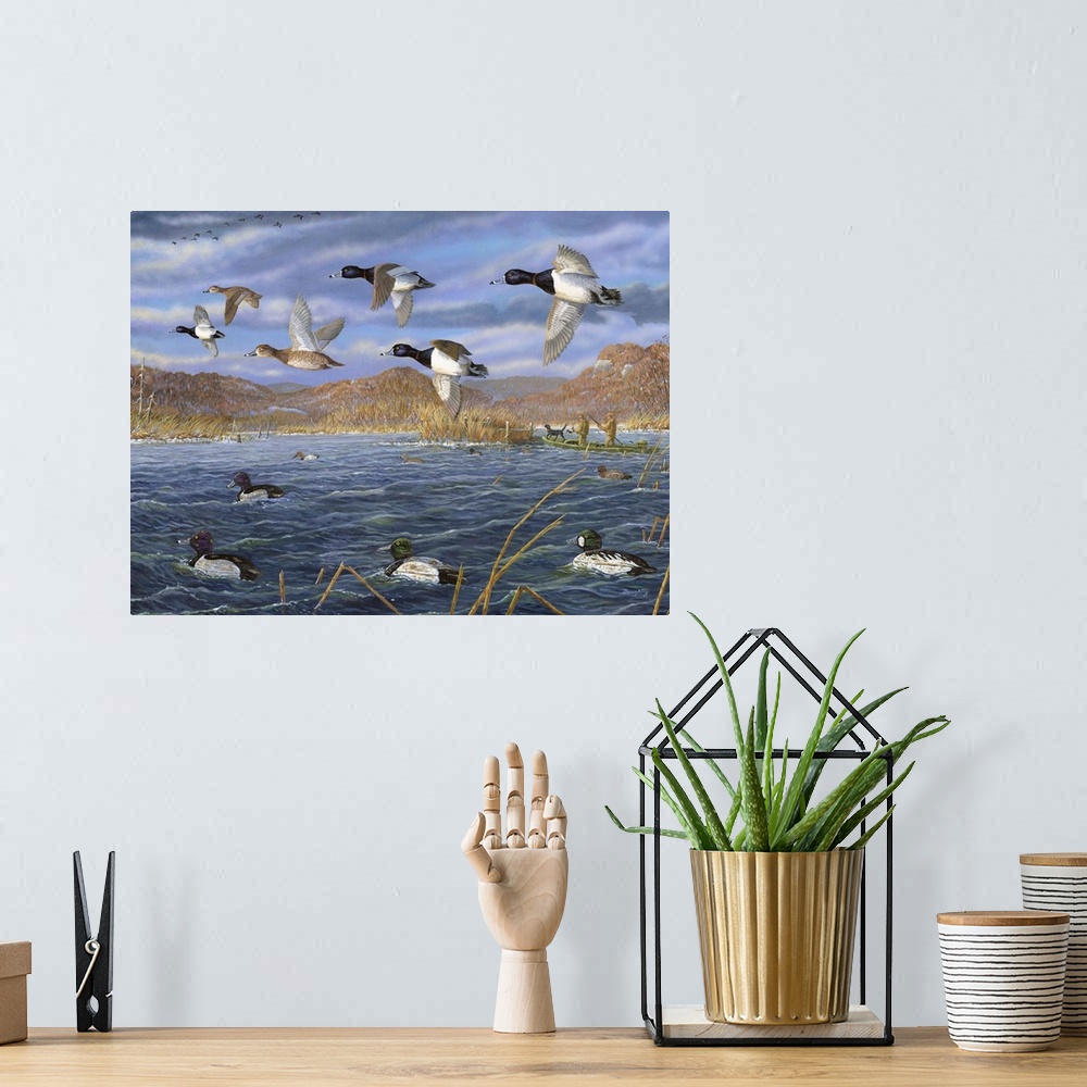 A bohemian room featuring Contemporary artwork of decoys on the water and scaups in flight over the Mississippi River.