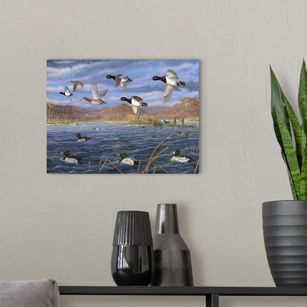 A modern room featuring Contemporary artwork of decoys on the water and scaups in flight over the Mississippi River.