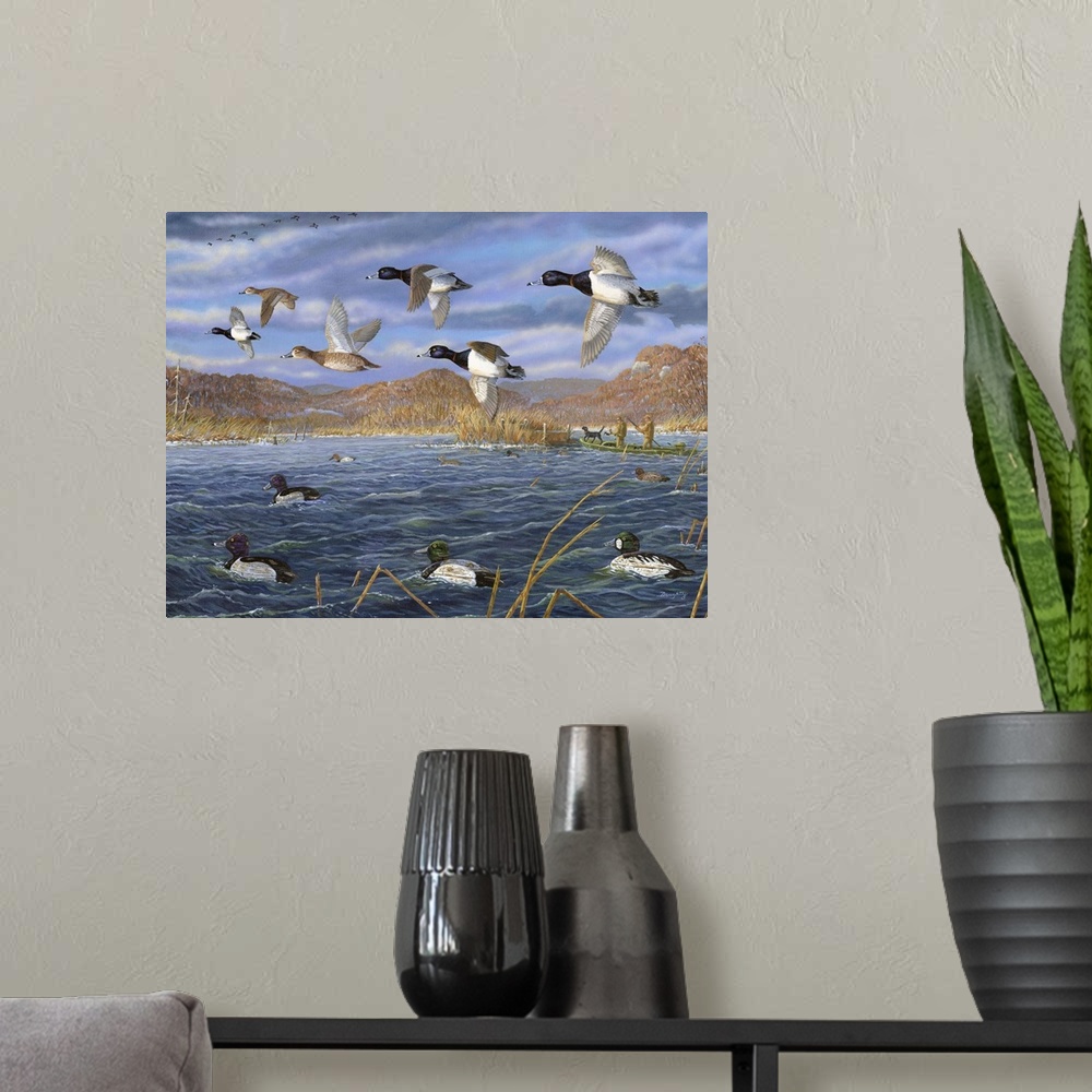 A modern room featuring Contemporary artwork of decoys on the water and scaups in flight over the Mississippi River.
