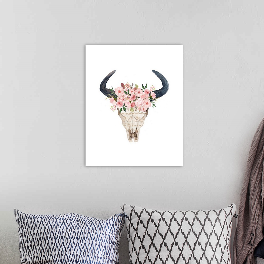 A bohemian room featuring A watercolor painting of a bull skull with pink flowers.
