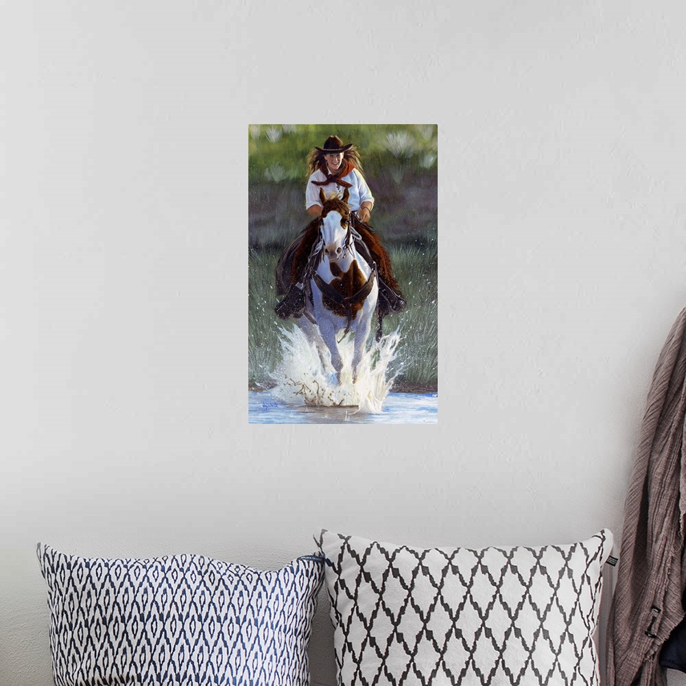A bohemian room featuring Painting of a cowgirl riding a paint horse through a shallow river.