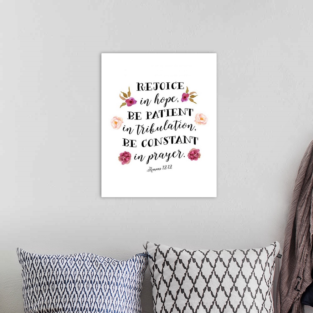 A bohemian room featuring Handlettered decor featuring the message, "Rejoice, in hope, be patient in tribulation, be consta...
