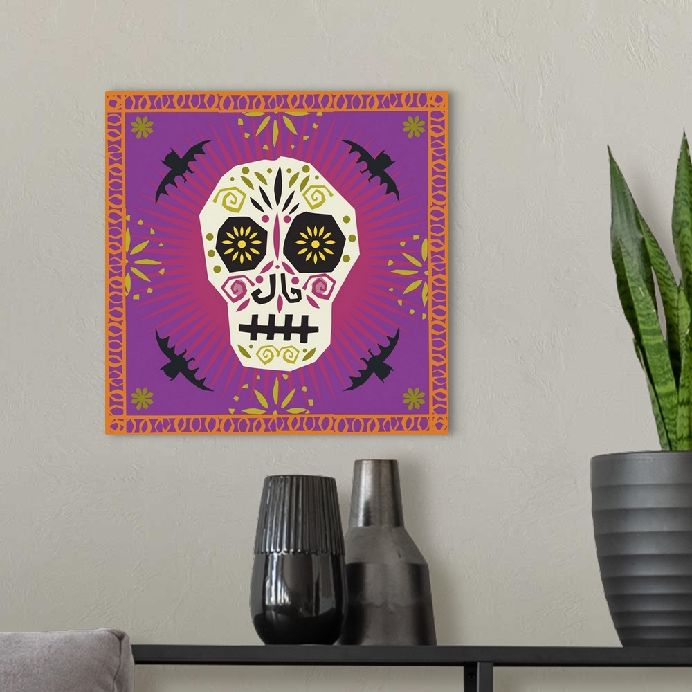 A modern room featuring Decorated sugar skull surrounded by bats and a decorative border.