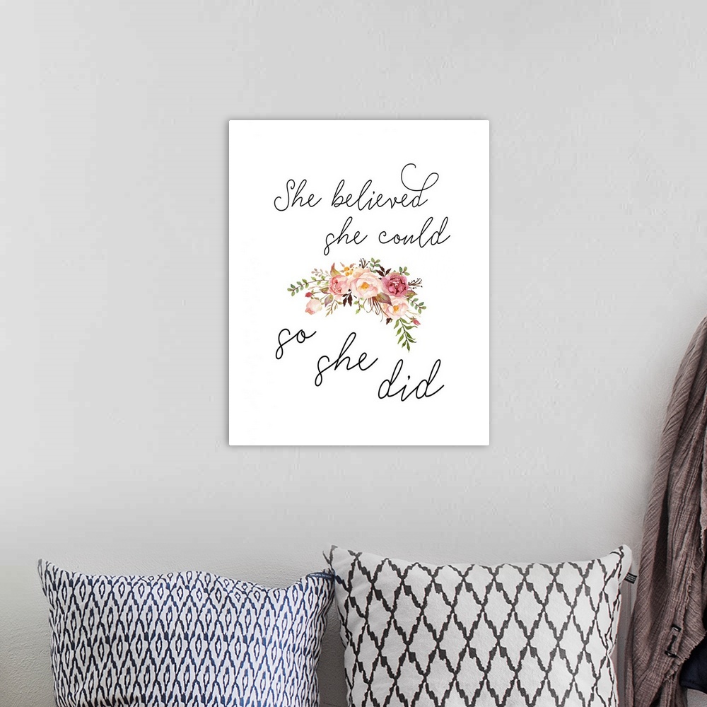 A bohemian room featuring Handlettered decor featuring the message, "She believed she could, so she did" in black text plac...