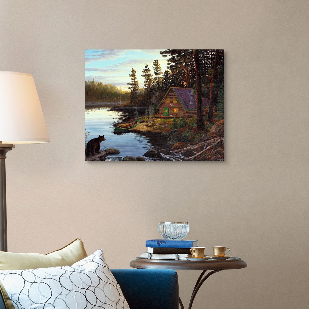 A traditional room featuring Photograph of cabin in the woods by lake with canoe under a cloudy sky.  There is a bear on the o...