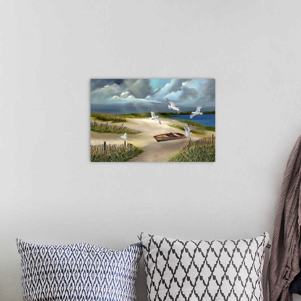 A bohemian room featuring Contemporary artwork of beach landscape under a cloudy sky.