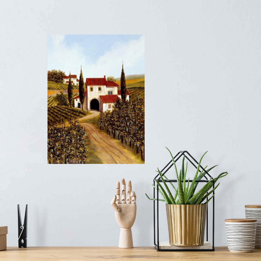 A bohemian room featuring Painting of a red roofed Tuscan villa in the middle of a vineyard.