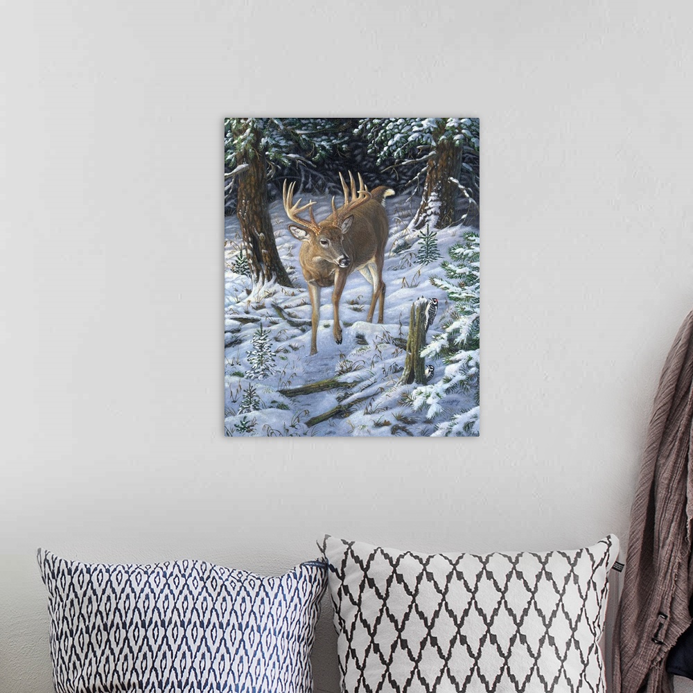 A bohemian room featuring Contemporary artwork of a deer walking through a forest covered in snow.