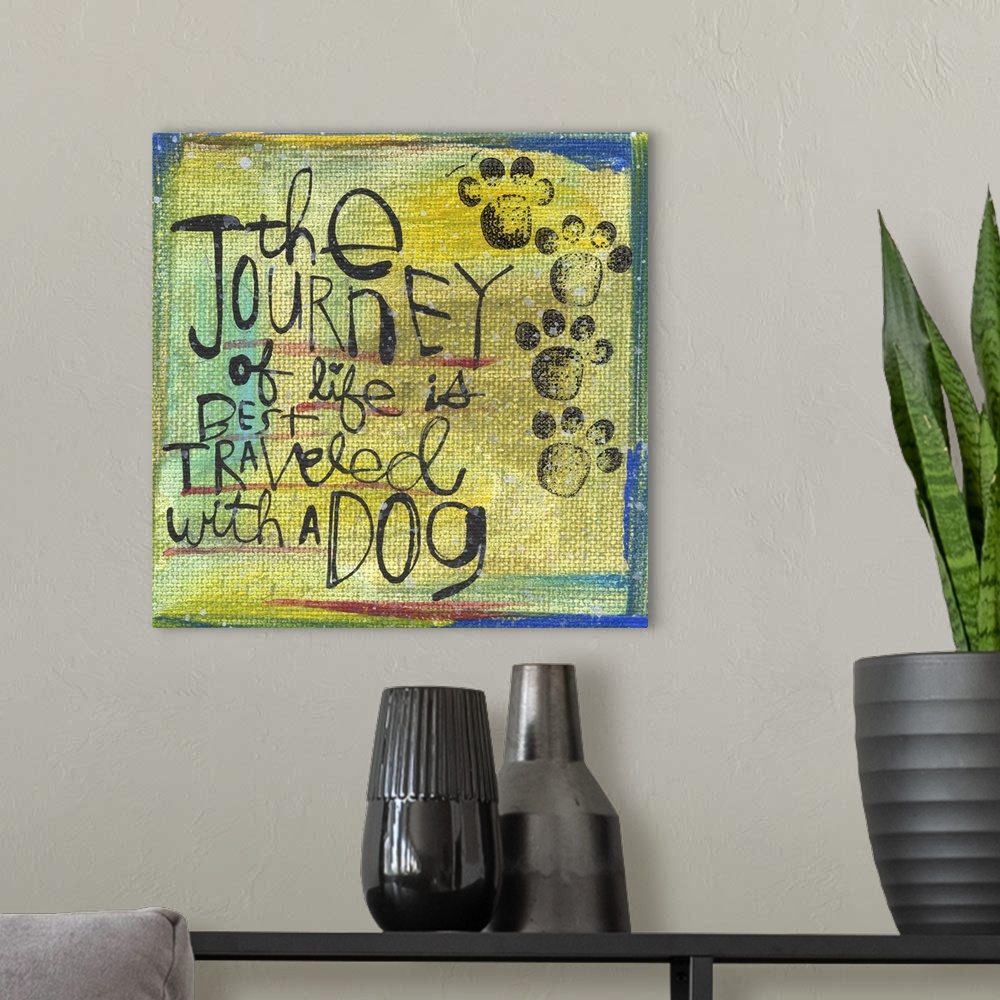 A modern room featuring Contemporary colorful and rustic looking sentiment artwork.