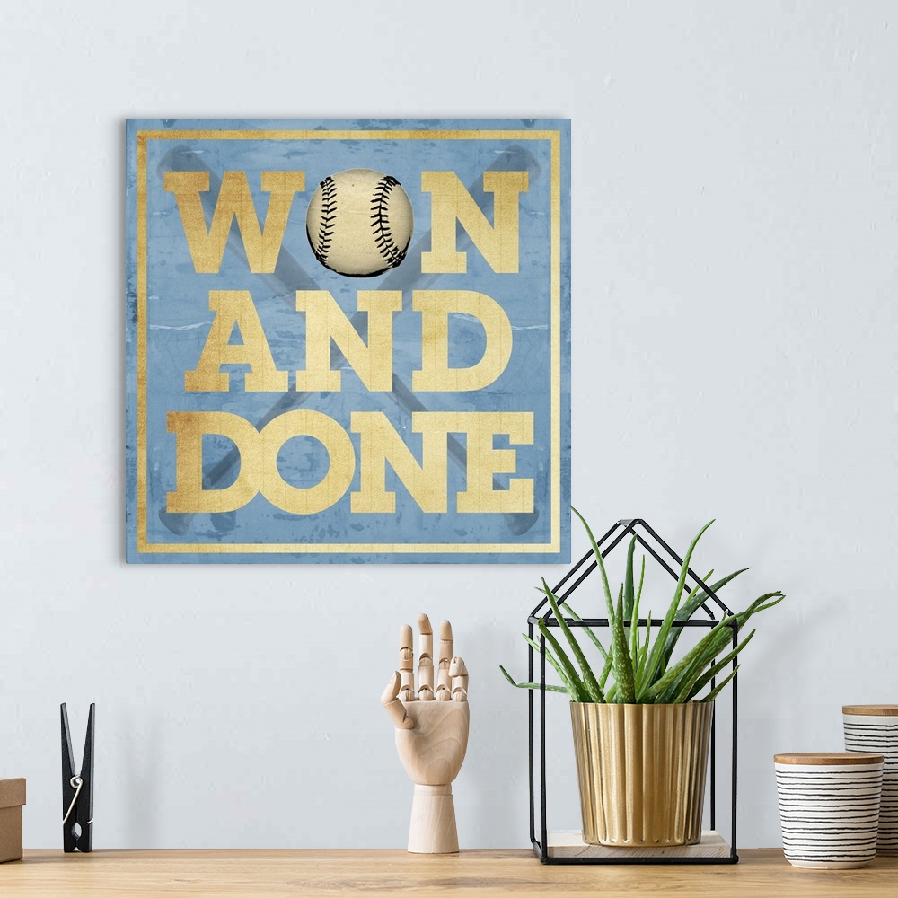 A bohemian room featuring Won and Done Typography Art - Blue