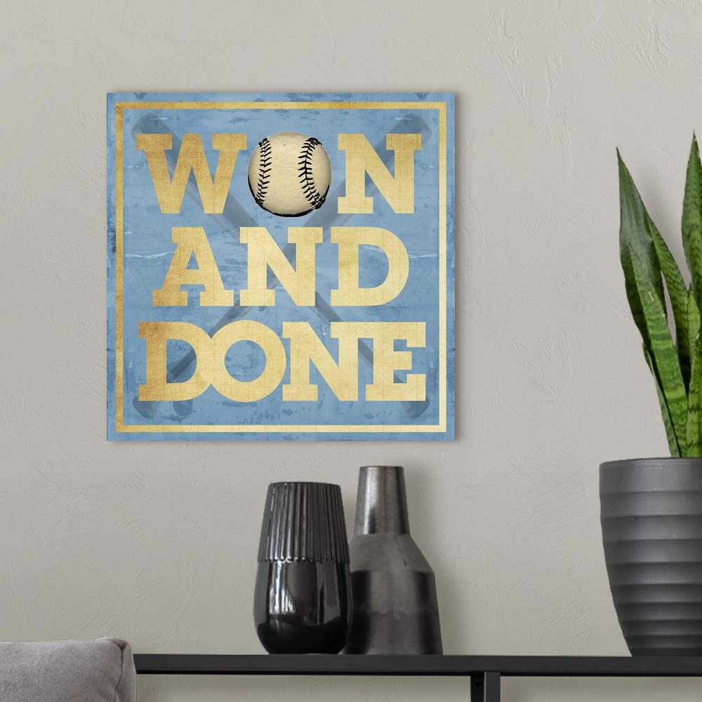 A modern room featuring Won and Done Typography Art - Blue
