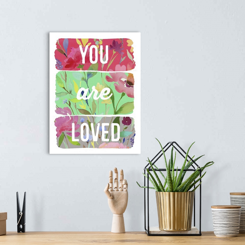 A bohemian room featuring You are Loved planks