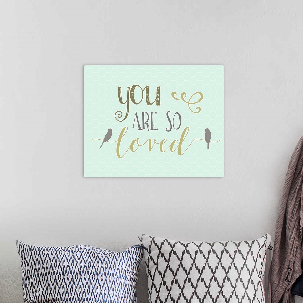A bohemian room featuring Contemporary handlettering style artwork.
