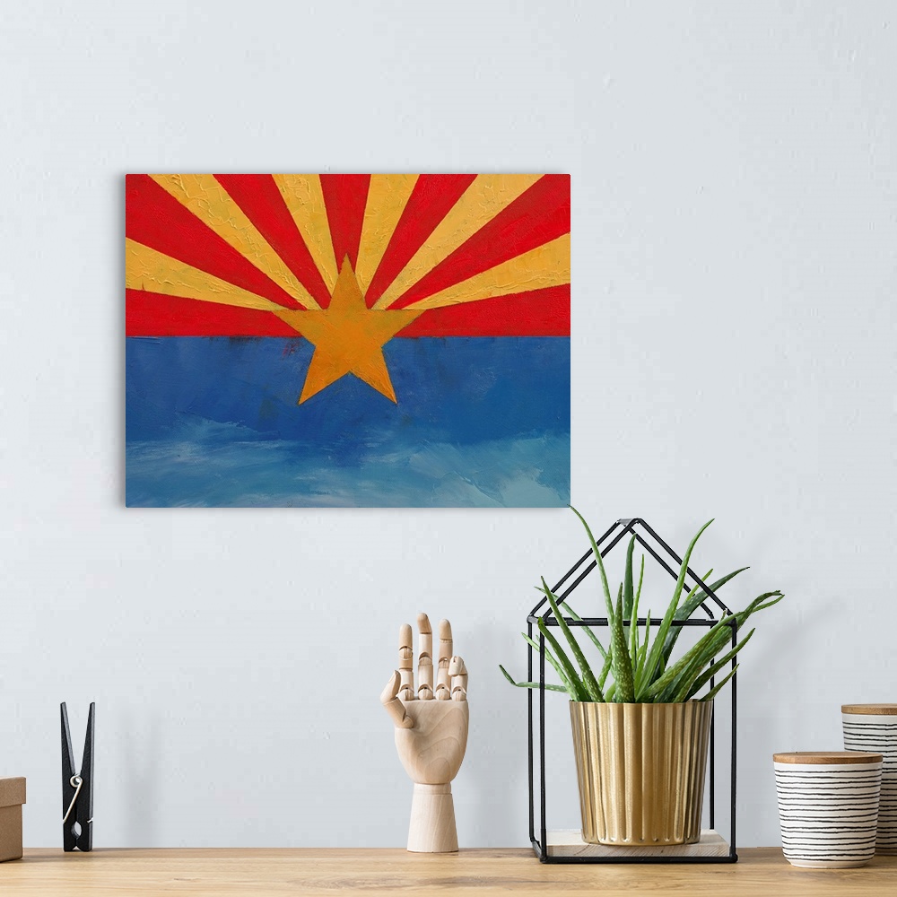 A bohemian room featuring A contemporary painting of the Arizona state flag.
