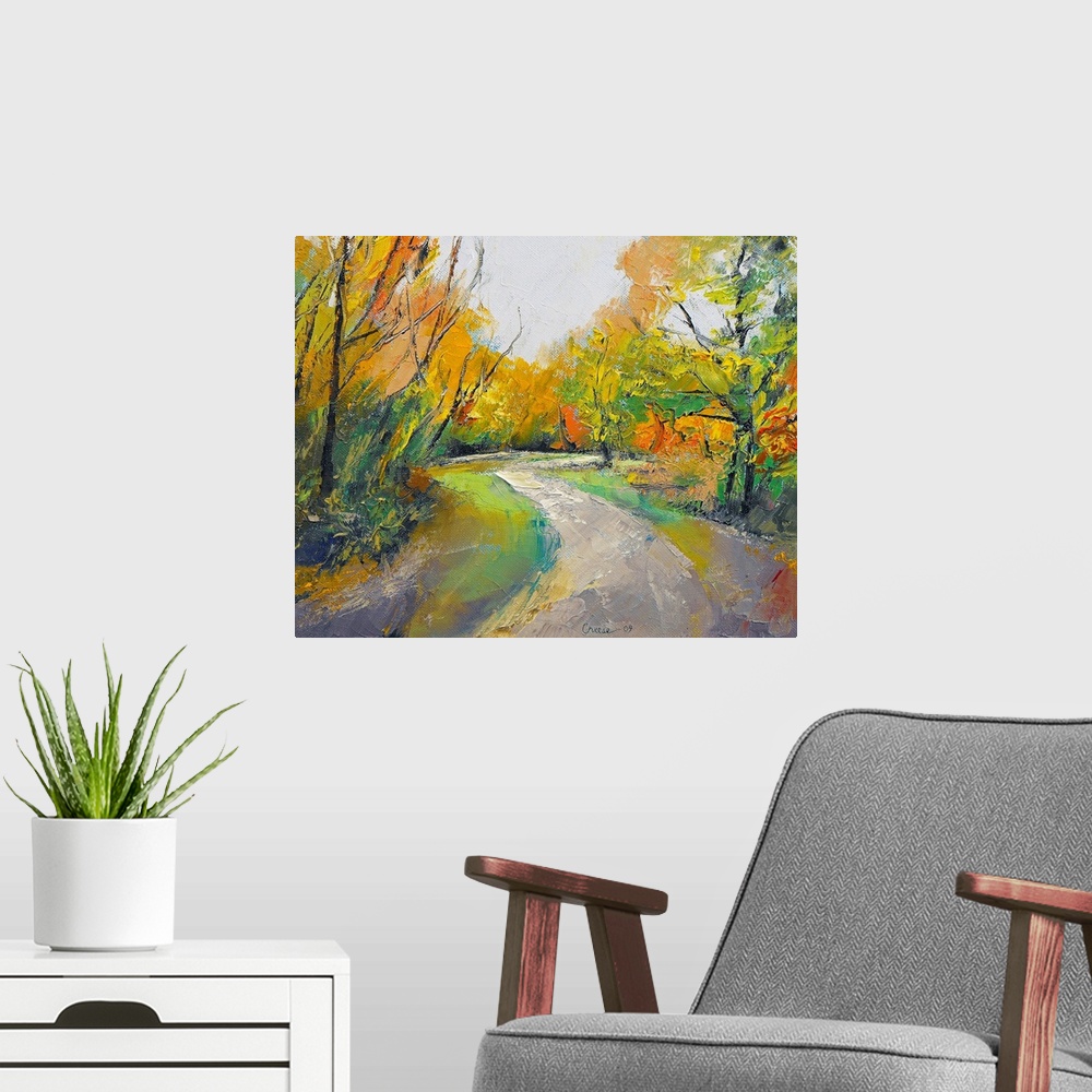 A modern room featuring Painting of a road in the middle of a forest in the fall.