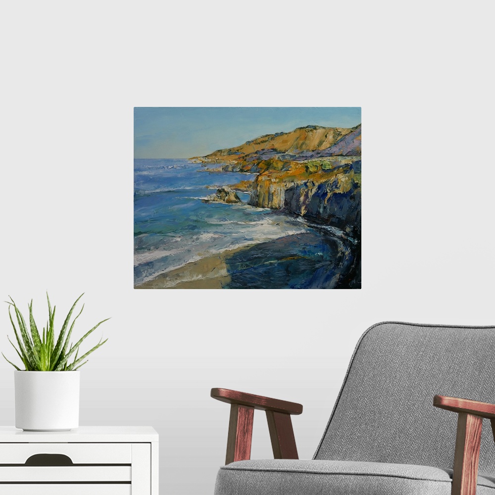 A modern room featuring A contemporary painting of a the Big Sur coastline.