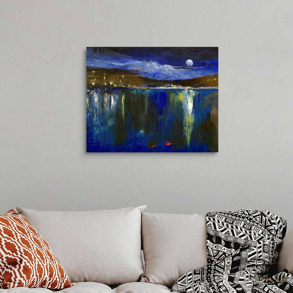 A bohemian room featuring The moon, hillside, and village lights reflect on the still surface of a lake in this contemporar...
