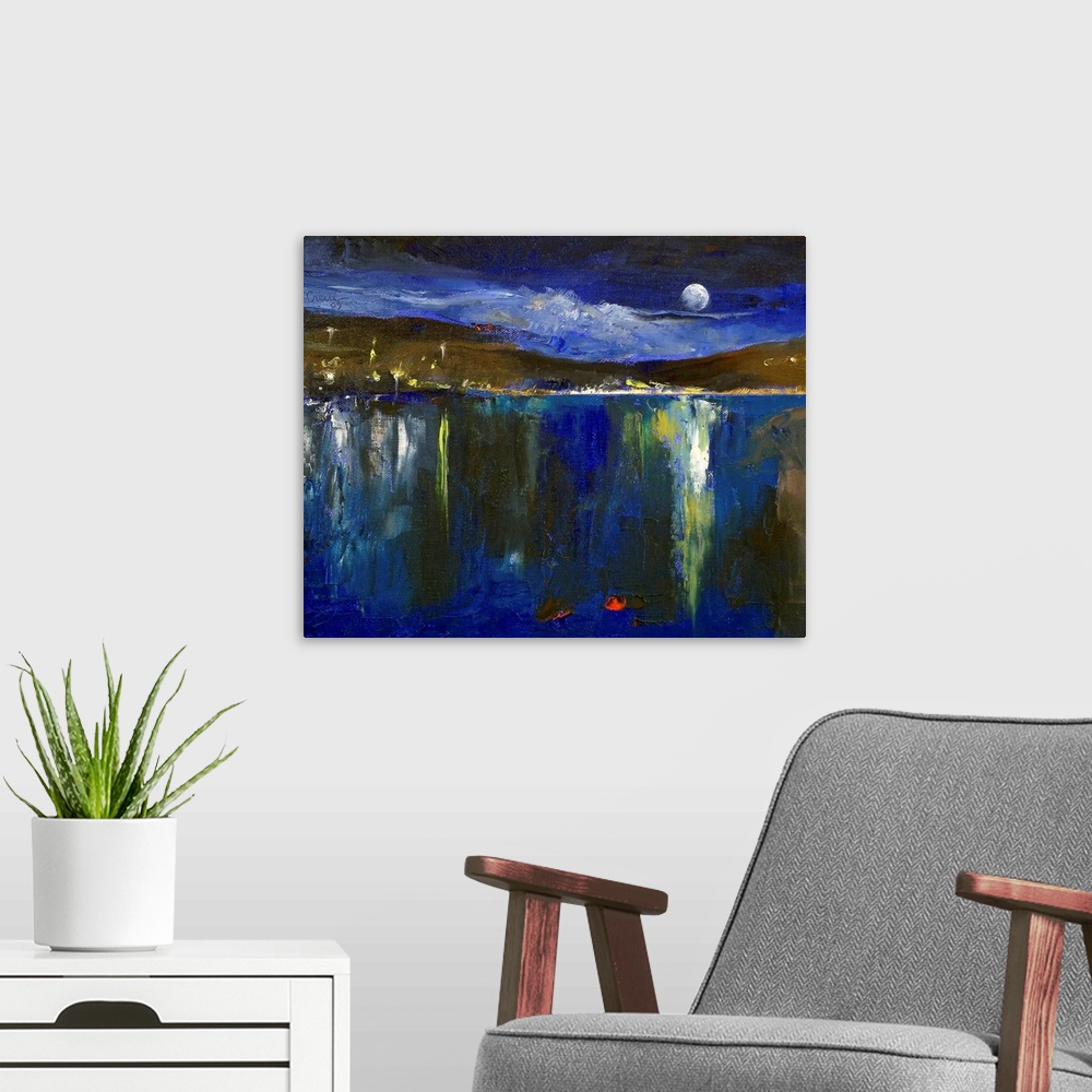 A modern room featuring The moon, hillside, and village lights reflect on the still surface of a lake in this contemporar...