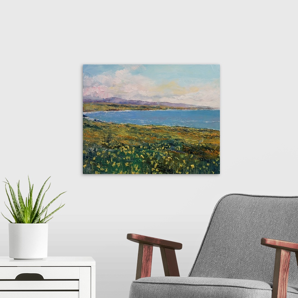 A modern room featuring A contemporary painting of a coastal Californian landscape.