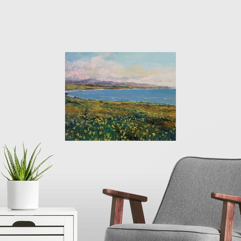 A modern room featuring A contemporary painting of a coastal Californian landscape.
